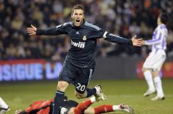 爱游戏官网-街道狂飙与绿茵神话，当F1引擎轰鸣遇见足球奇迹